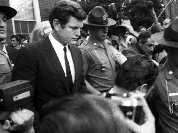 Ted Kennedy is escorted from court after pleading guilty to leaving the scene of the Chappaquiddick incident