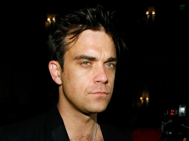 Robbie Williams is said to be back in the studio with Take That