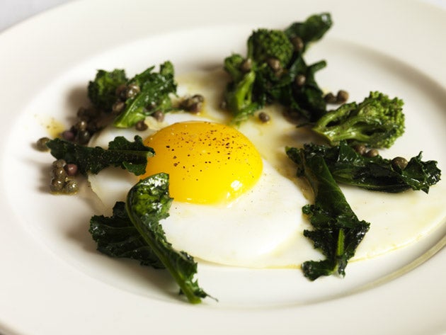 Spoon the broccoli, capers and butter around the eggs and serve immediately