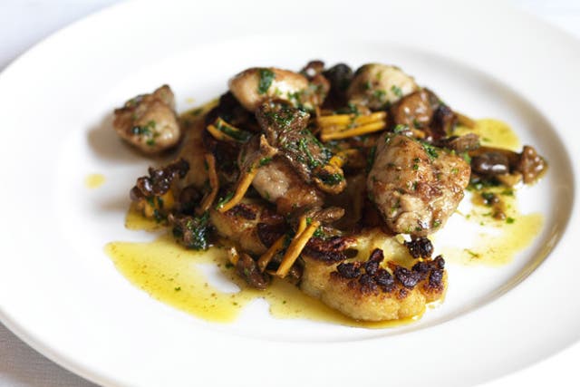 To serve, put a slice of cauliflower on each plate and arrange the sweetbreads and chanterelles on top