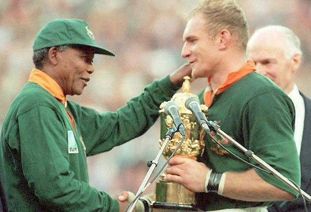 Francois Pienaar received the World Cup trophy from Nelson Mandela in rugby’s most iconic image