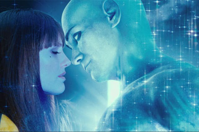 Silk Spectre and Doctor Manhattan share an intimate moment