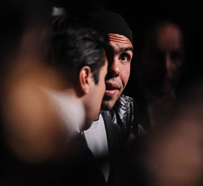 Carlos Tevez (right) speaks with his agent Kia Joorabchian