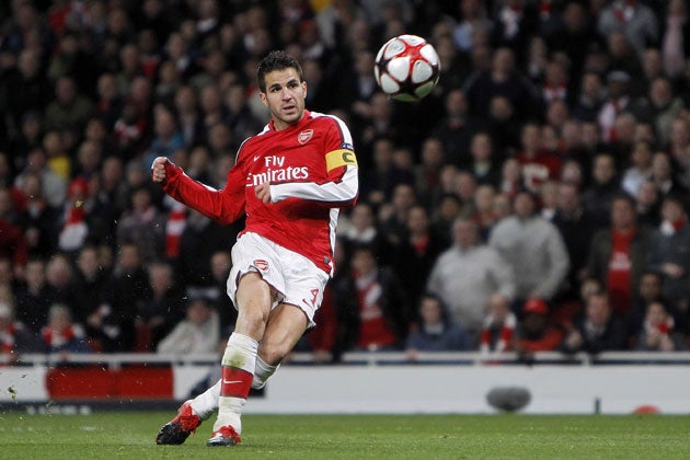 Cesc Fabregas says Arsenal are not out of the title race