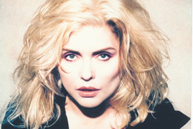 These never-before-seen photographs of Blondie's Debbie Harry reveal the &quot;Heart of Glass&quot; singer perched on her friend, the cult designer Stephen Sprouse, who helped create her pop-punk image.