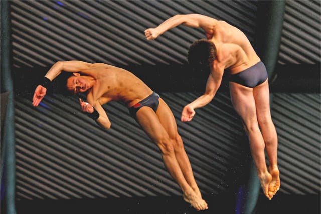 Britain's Tom Daley and Max Brick competing together - Daley has a triceps tear