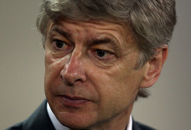Bolton are unhappy with Arsenal's manager Arsène Wenger
