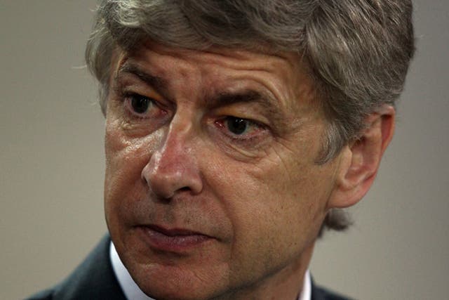Bolton are unhappy with Arsenal's manager Arsène Wenger