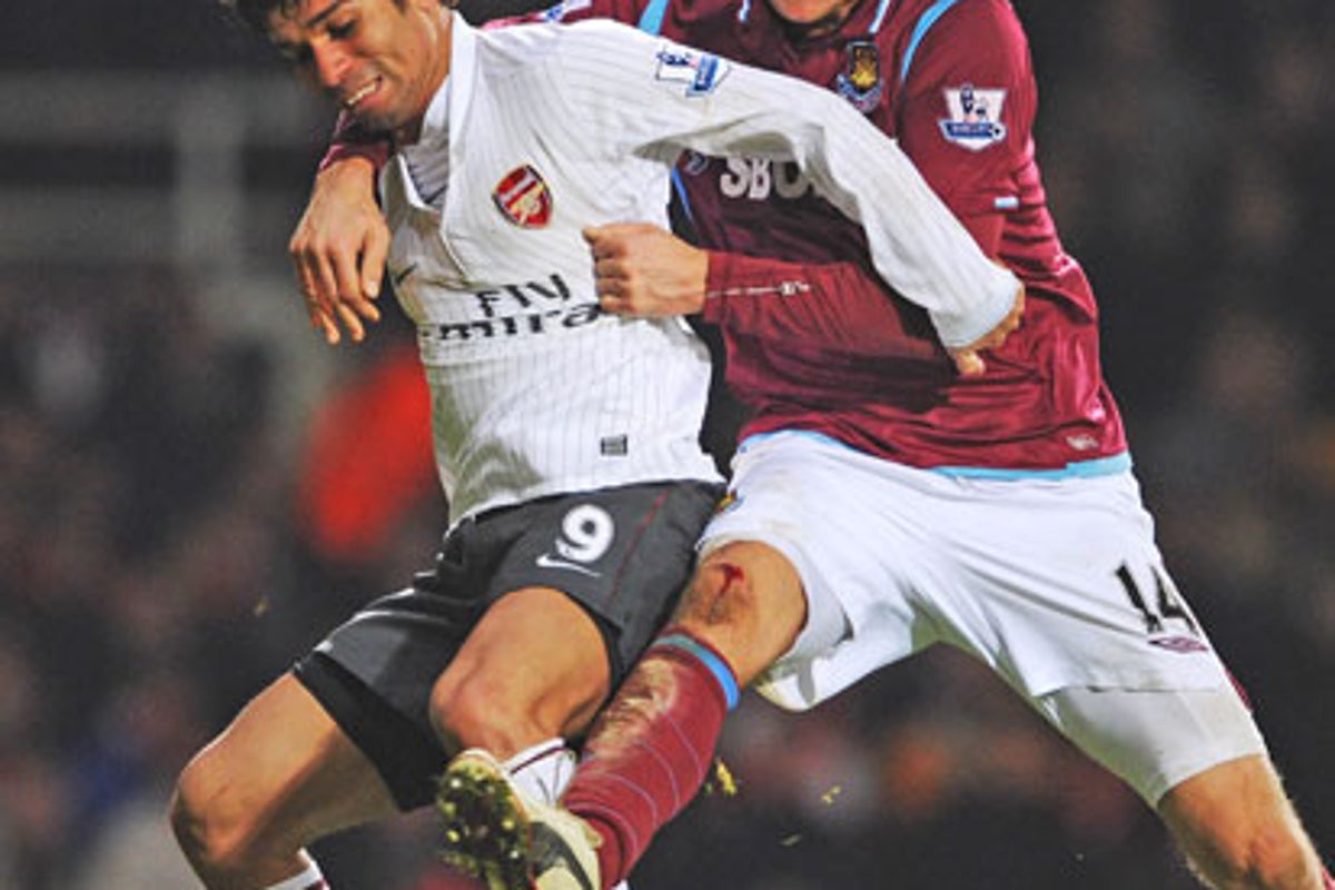 Wenger admits Bendtner's injury may force hand in transfer window | The ...