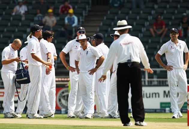 England can only look on as the umpire signals the result of their referral against South Africa captain Graeme Smith