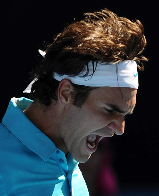 Roger Federer chastises himself during a straight-sets cruise over world No 32 Albert Montanes