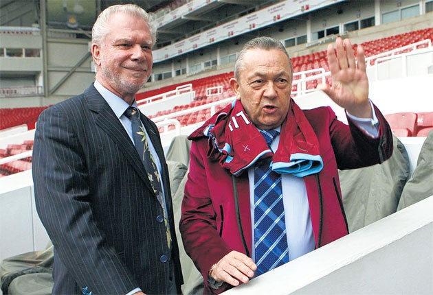 David Gold (left) and David Sullivan at Upton Park after announcing their takeover of Premier League strugglers West Ham