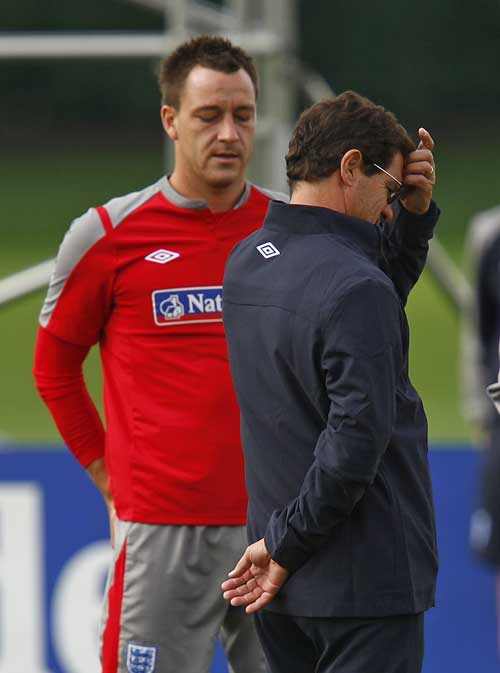 Fabio Capello (right) stripped John Terry or the captaincy