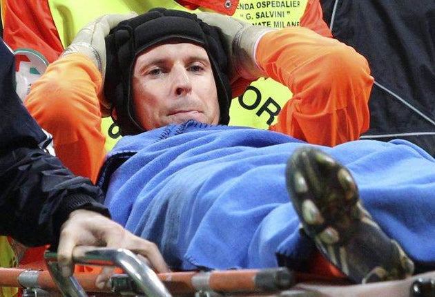 The Chelsea goalkeeper Petr Cech is carried off on a stretcher during the 2-1 Champions League defeat to Internazionale at San Siro on Wednesday