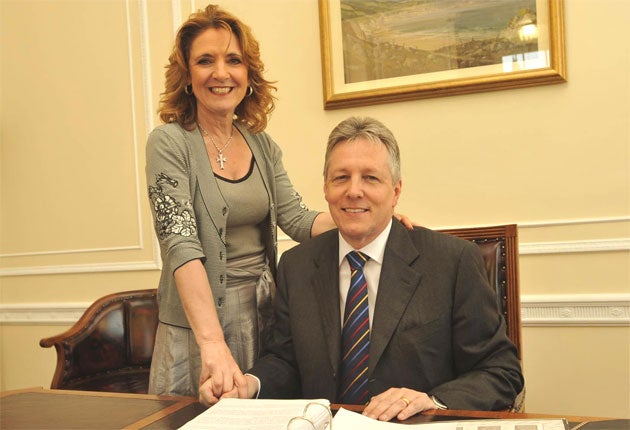 Iris Robinson, pictured here with her husband Peter, is among the DUP politicians whose words will be set to music in a new production