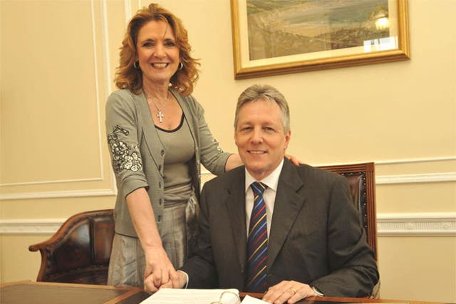 Iris Robinson, pictured here with her husband Peter, is among the DUP politicians whose words will be set to music in a new production