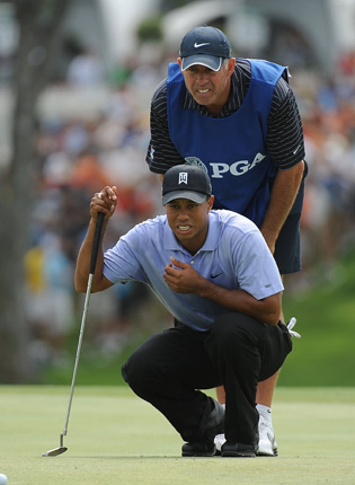 Woods forgives caddie for critical comments | The Independent | The ...