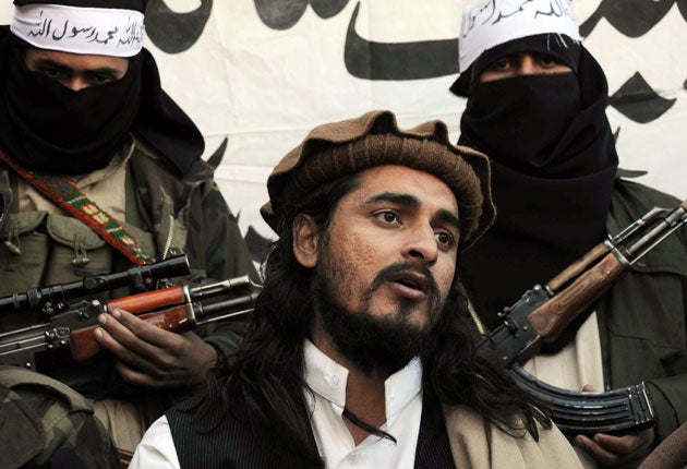 A file photo of Pakistani Taliban commander Hakimullah Mehsud, whose death by drone strike has been described as 'the death of all peace efforts'
