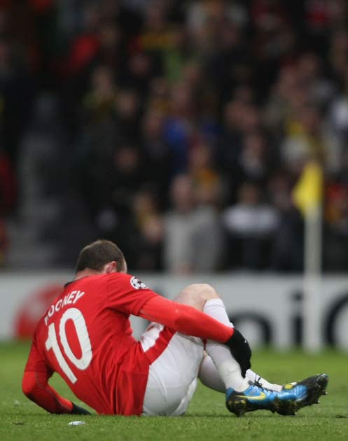Rooney hurt his ankle again playing against Bayern at Old Trafford