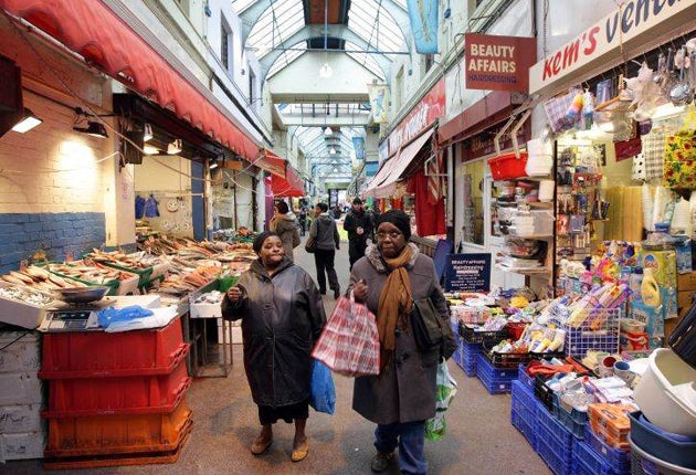 Ladies shopping in Brixton's indoor market