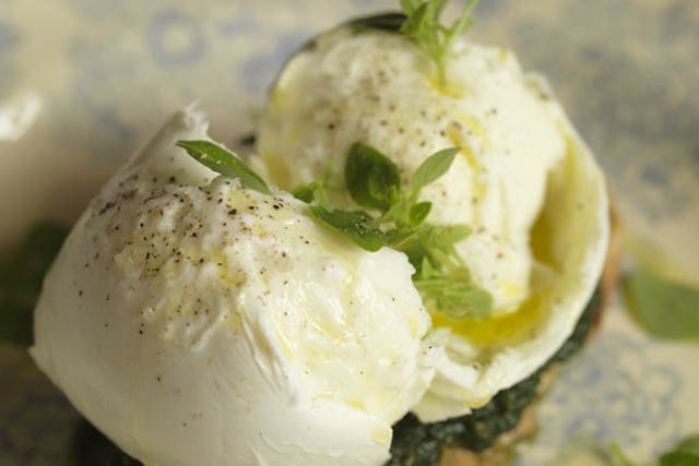 Place the mozzarella on the sourdough, spoon the olive oil over and scatter with basil leaves
