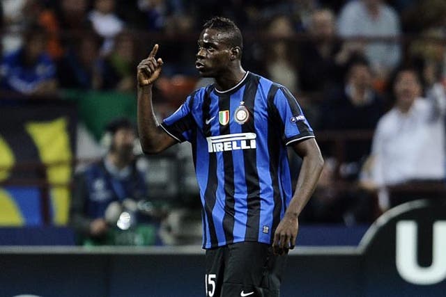 Balotelli has been linked with United and City