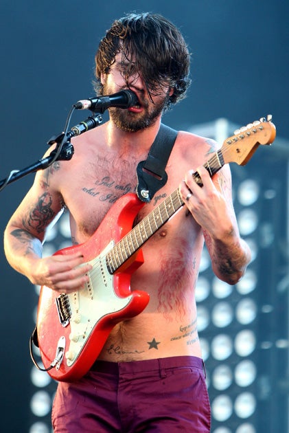 Simon Neil of Biffy Clyro performs on the main stage during day two of the Isle of Wight Festival 2010 at Seaclose Park