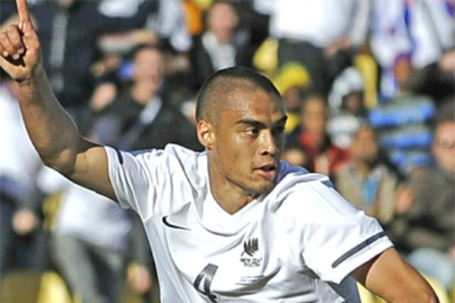 Winston Reid celebrates after scoring for New Zealand at the World Cup