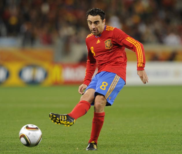 Xavi says Spain are improving