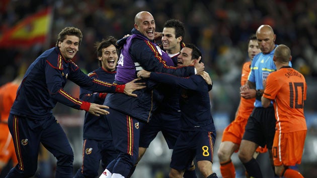 Fabregas celebrates with his team-mates