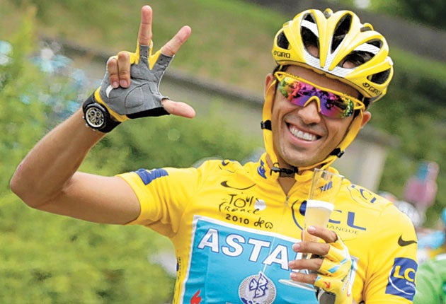 The Spaniard Alberto Contador celebrates his Tour de France victory