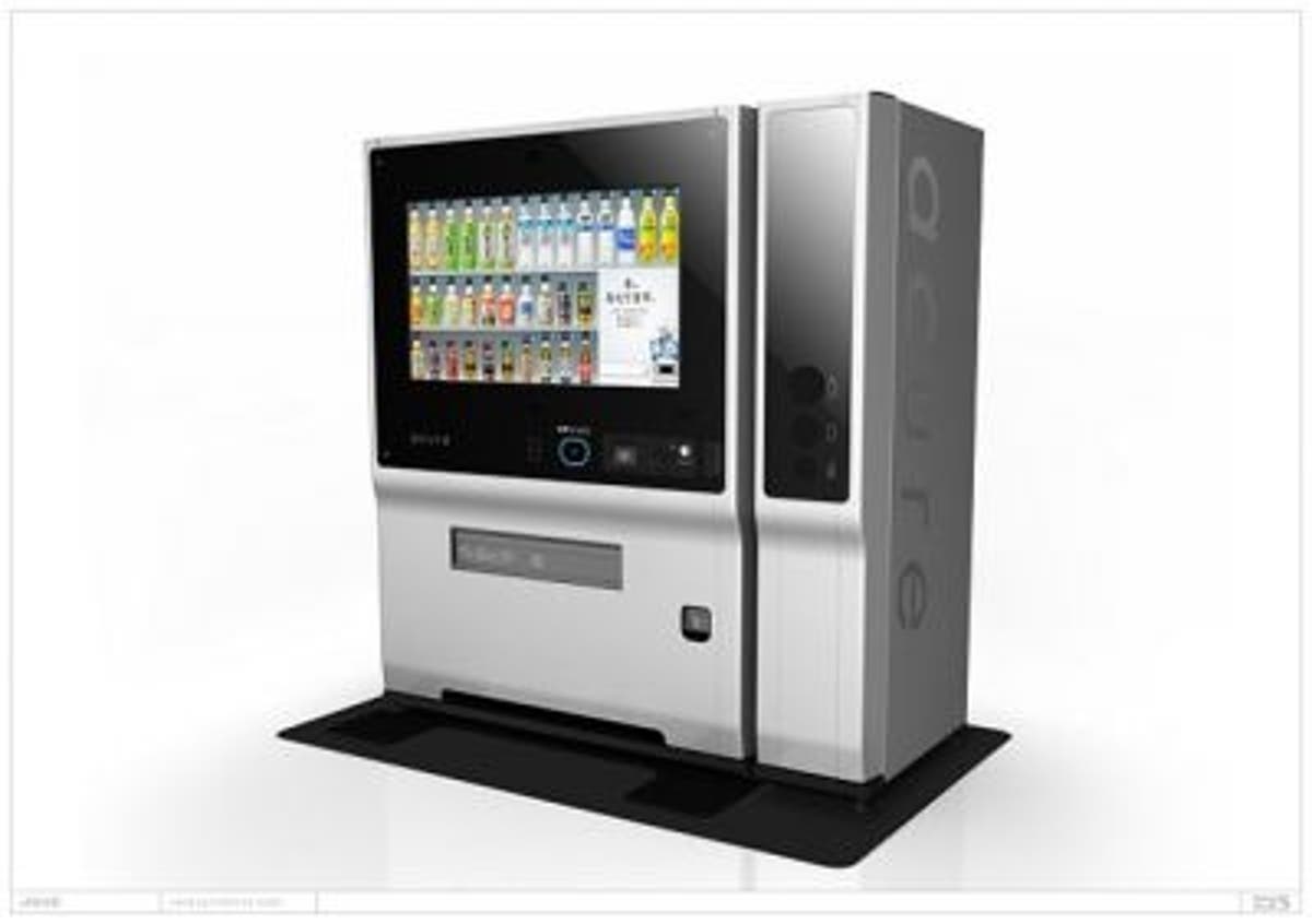 Smile for the vending machine camera while it selects your drink The