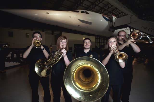 Hitting a high note: Musicians get ready to play on Concorde