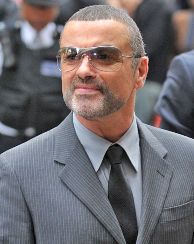 George Michael was found slumped at the wheel of his car after it smashed into a branch of Snappy Snaps in north London in July