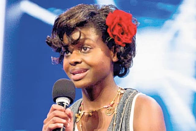 Former X Factor contestant Gamu has won her fight to stay in the UK