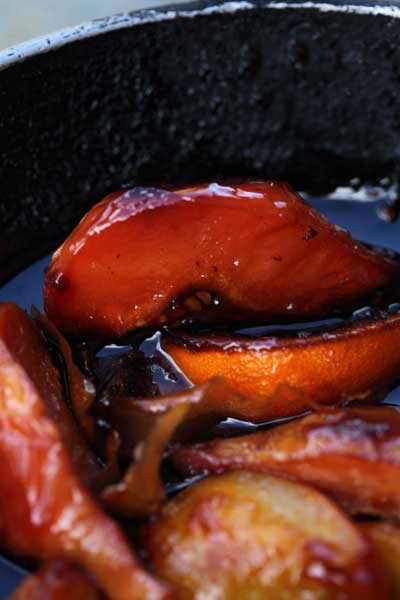 Roasted quinces with verjuice and plums - serve warm, with a large dollop of crème fraîche