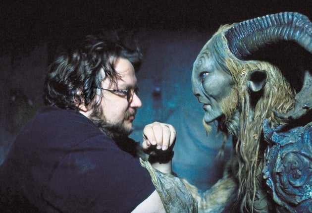 Del Toro with Pan, the title creature of his 2006 classic, Pan's Labyrinth