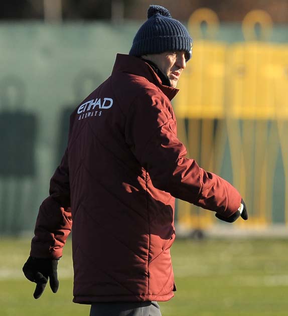 Mancini looks set to bring in Dzeko to improve City's chances of success