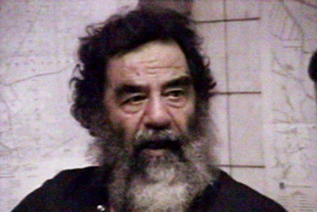 <p>Saddam Hussein after his capture in 2003</p>