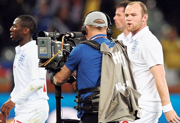 Wayne Rooney reacts to the boos from England's disgruntled supporters during the World Cup in South Africa