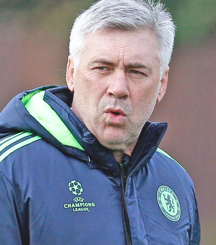 Ancelotti faced a banner outside Chelsea's training base