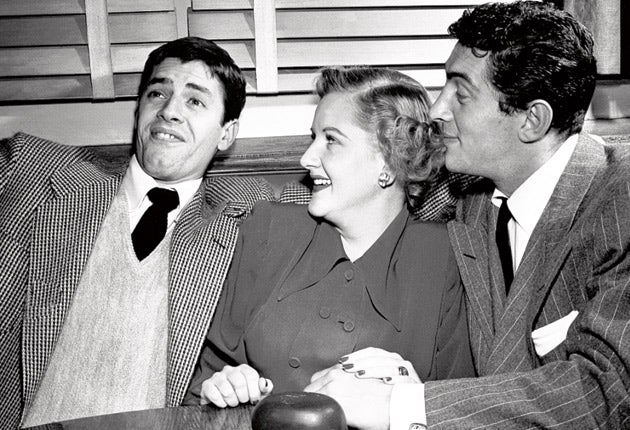 Lewis goes through his comic routine for an appreciative Margaret Whiting and Dean Martin in 1949