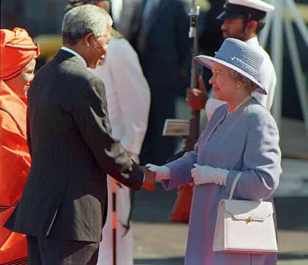 President Mandela greets Queen Elizabeth II on her official arrival at Cape Town's Waterfront in 1995