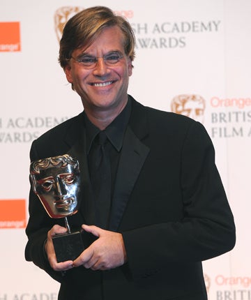 Aaron Sorkin receiving his award for Adapted Screenplay for The Social Network