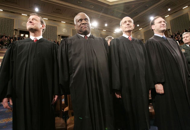 Justice Clarence Thomas, second left