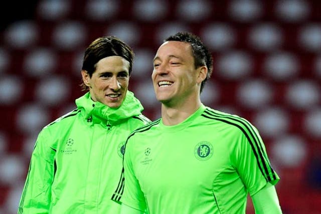 Torres pictured with Chelsea captain John Terry