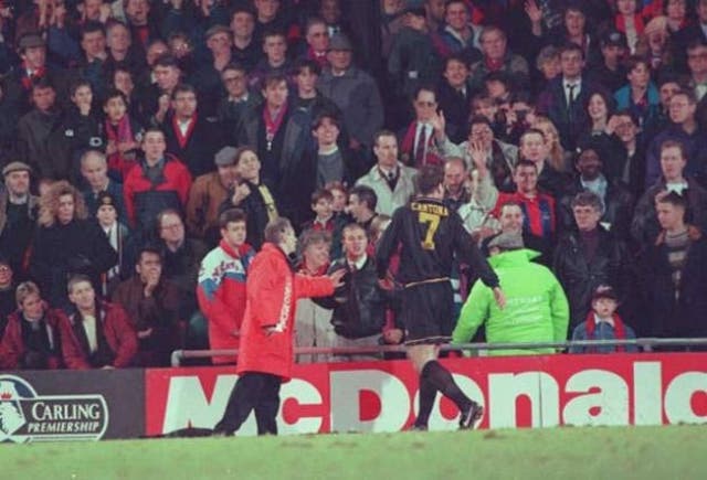 Manchester United forward Eric Cantona was incensed by abuse from fans as he headed to the dressing after being sent off against Crystal Palace in 1995