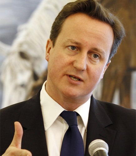 David Cameron has told the Treasury to give the Ministry of Defence a reprieve on its overspent 2011-12 budget