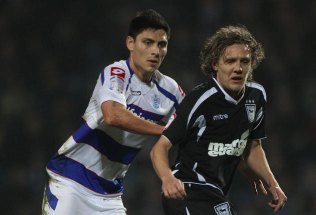Alejandro Faurlin (left), the Argentine midfielder whose signing has caused QPR to be charged by the FA