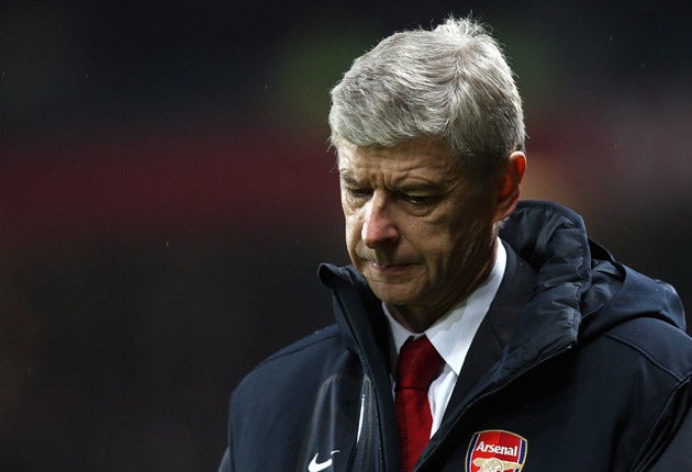 Wenger says his team must keep fighting